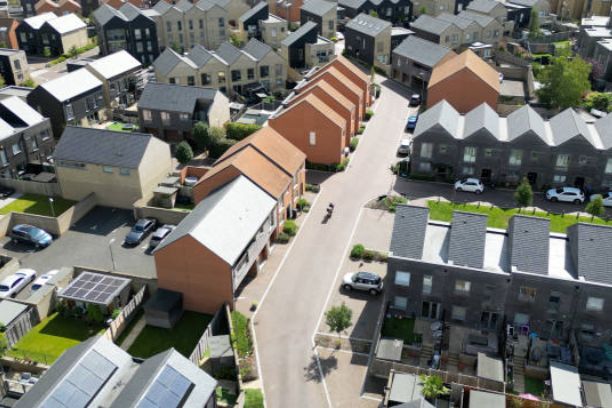 Aerial view of suburban homes with solar panels